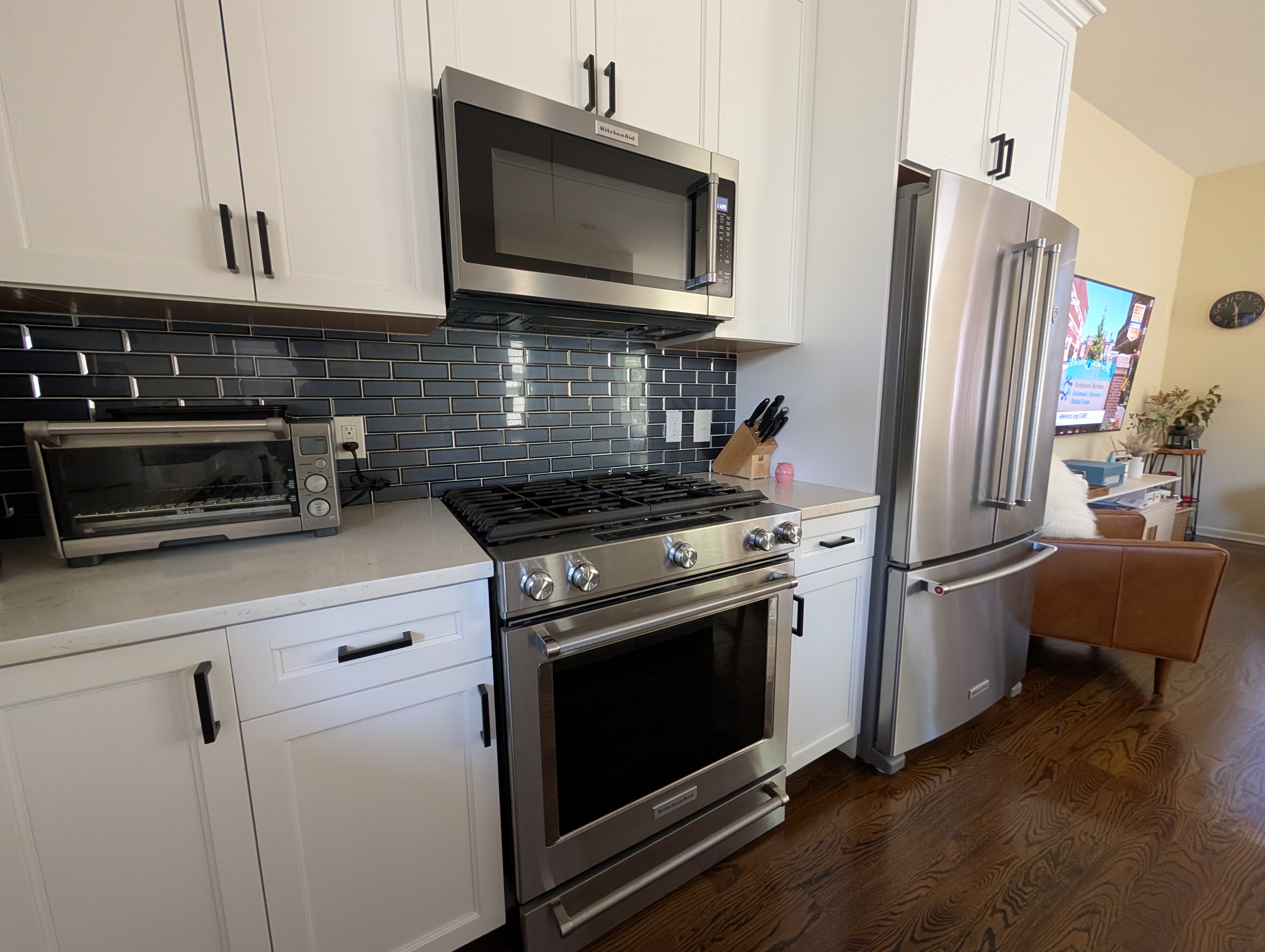 Stainless appliances and subway backsplash